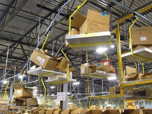 Corrugated carton trash removal conveyors