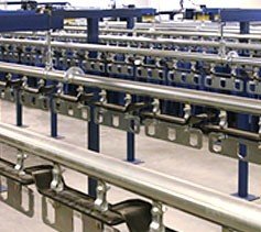 uniform conveyor system that has multiple enclosed tracks.