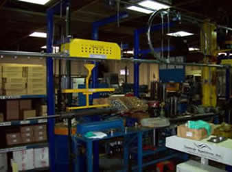 over/under conveyor for automotive application