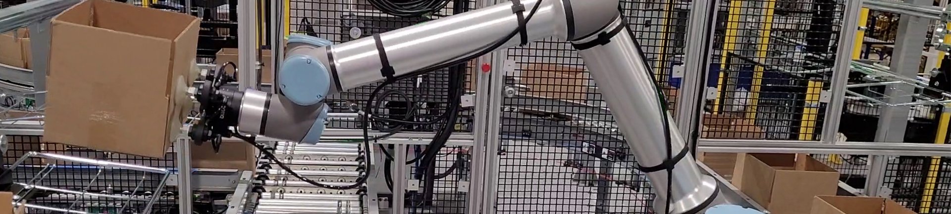pacline-conveyors-robotic-conveyor-integration overhead conveyor with robot integration