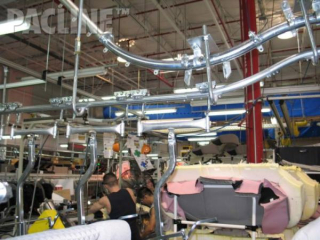 Power assistance on gravity rail and trolley conveyors is often needed to move parts up an incline.
