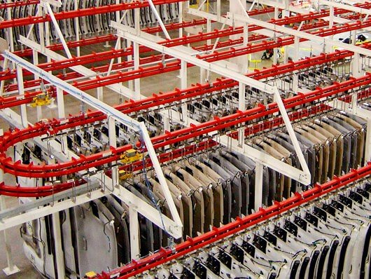 Monorail overhead conveyor for parts storage