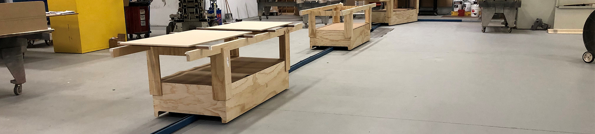 Woodworking paint and finish towline conveyor