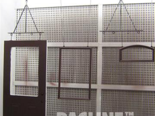 Conveyor used to transfer wooden doors and windows through, paint, stain and curing processes.